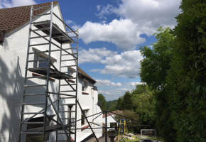 house painting from scaffolding